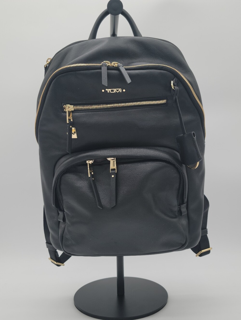 TUMI Black Leather Backpack with Gold Hardware